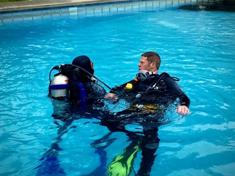 Rick Parker (Underwater Parker) with dive instructor I Wayan Mardika in the training pool at Tulamben, Bali during Open Water Course