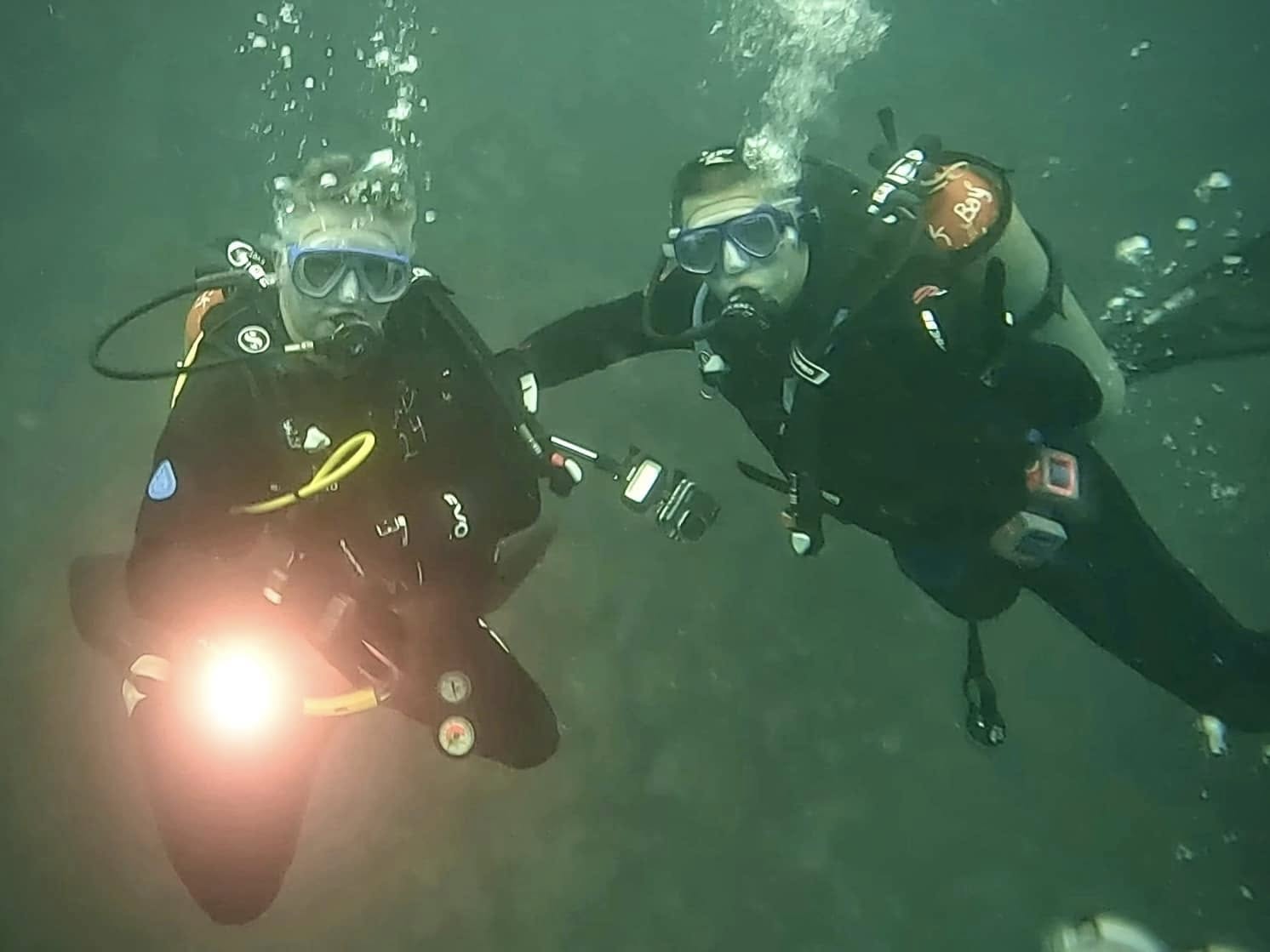 Rick Parker (Underwater Parker) with a dive buddy while diving in the Galápagos Islands.