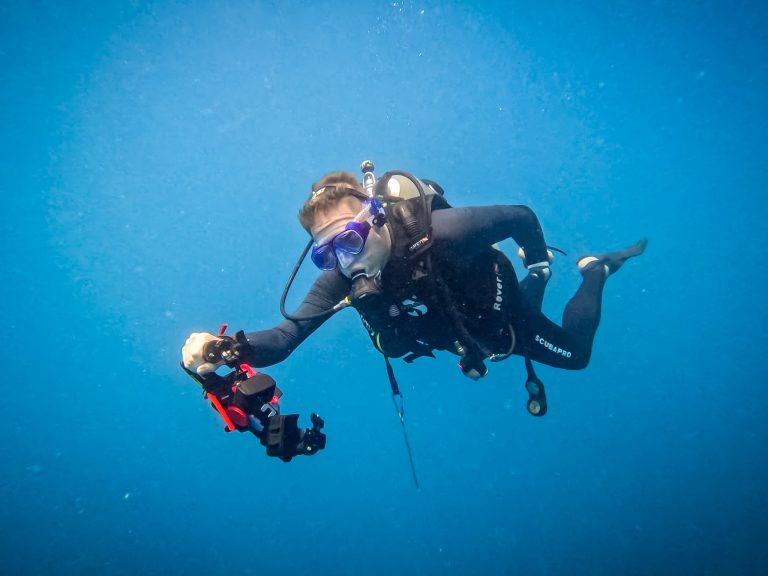 Underwater Parker (Rick Parker) striking a Superman pose with his TG-7 rig while diving at Tioman Island, Malaysia.