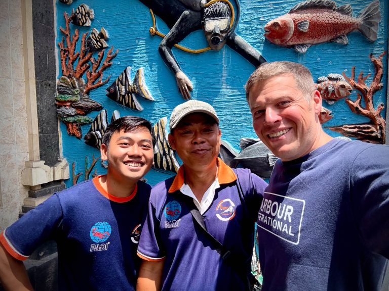 Rick Parker (Underwater Parker) with Siki, owner of Sianmay Dive Bali, and his dive guide in Candidasa, Bali